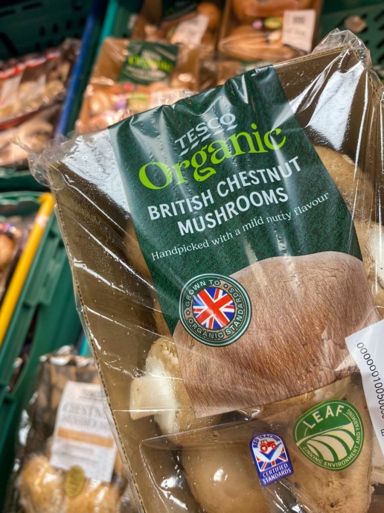 Photograph shows packaged mushrooms bought from a supermarket.