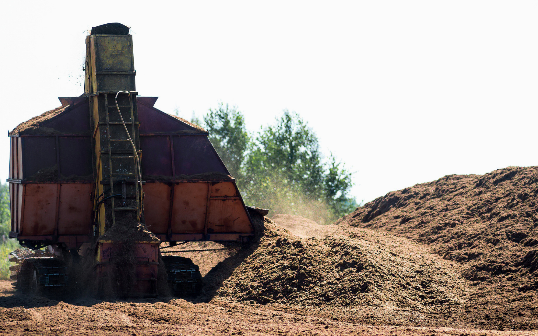 Peat extraction machinery working to extract peat from peatlands