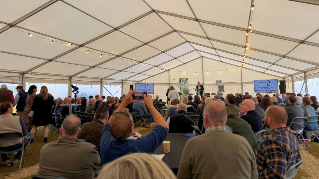 A group of people in a marquee